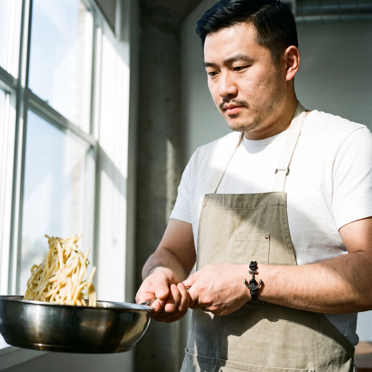 Black Anchor Bracelet – cooking in a loft kitchen | Brother & Sisters | SKU: 3621358-gun-black-XS-14-15, 3621358-gun-black-S-16-17, 3621358-gun-black-M-18-19, 3621358-gun-black-L-20-21, 3621358-gun-black-XL-22-23