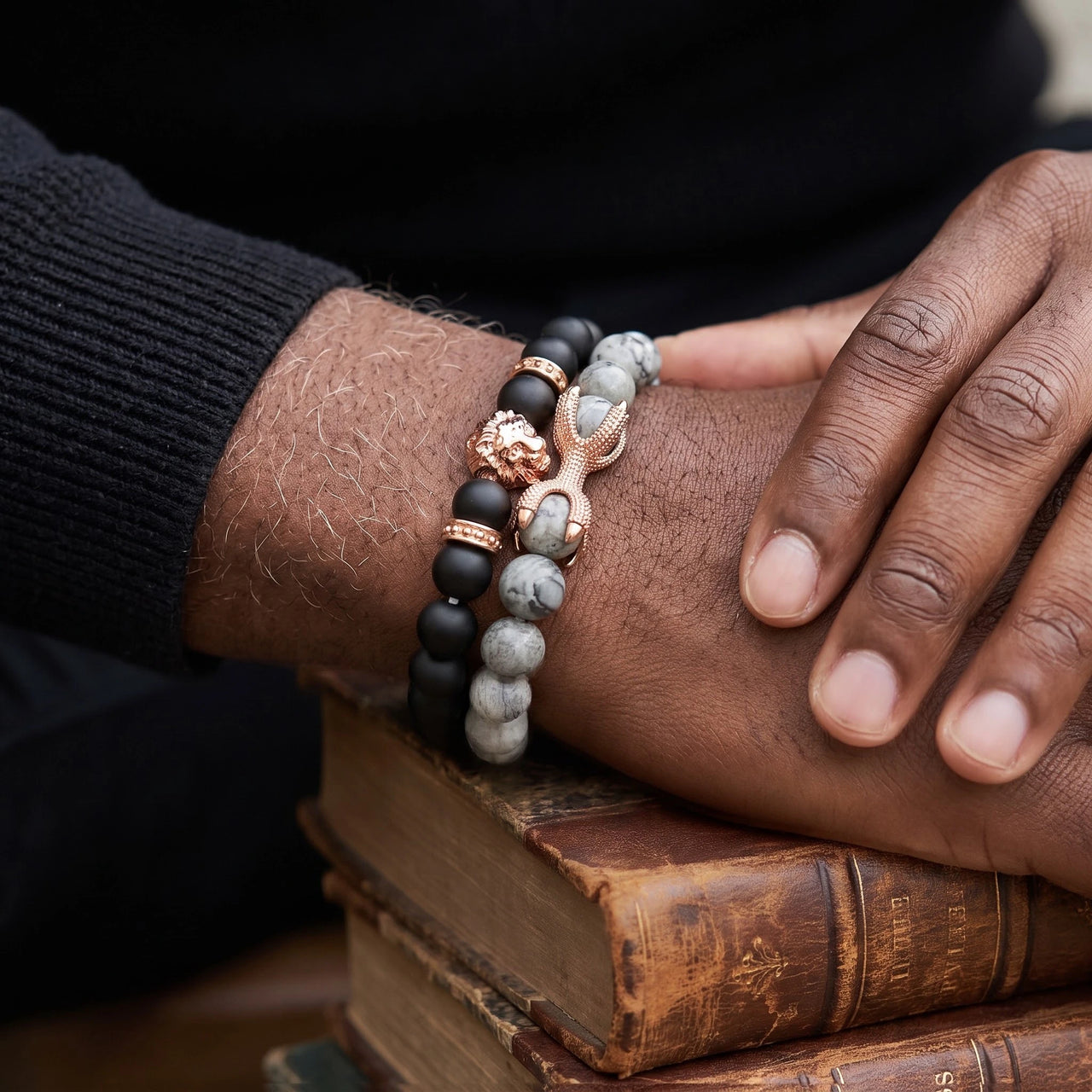 Rose Gold Lion with Black & Grey Stones Set – close-up worn on a man's wrist | Brother & Sisters | SKU: 21369621-rose-gold-XS-14-15, 21369621-rose-gold-S-16-17, 21369621-rose-gold-M-18-19, 21369621-rose-gold-L-20-21, 21369621-rose-gold-XL-22-23